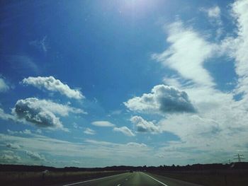 Country road passing through landscape