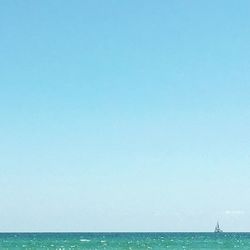 View of sea against blue sky