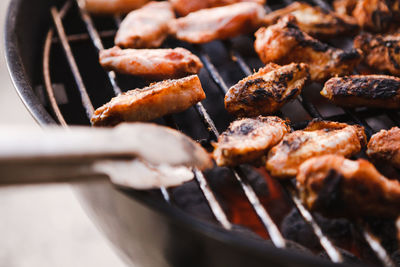 Close-up of meat on barbecue