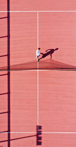 High angle view of person with umbrella on floor