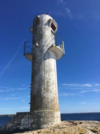 Low angle view of lighthouse against sky