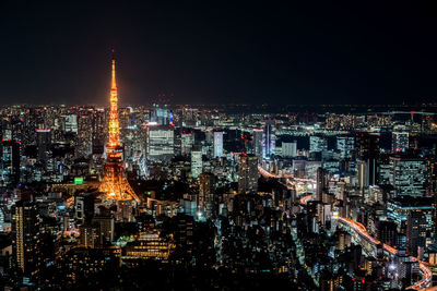 Illuminated buildings in city at night