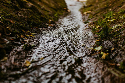 Close-up of water flowing through a sewage 