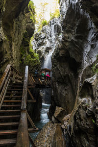 View of waterfall along rocks