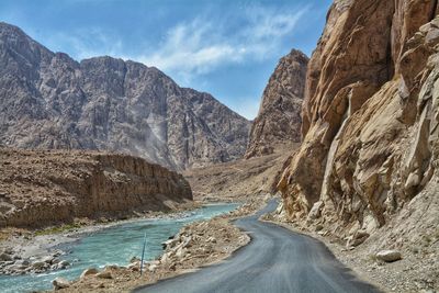 Panoramic view of road amidst mountains against sky