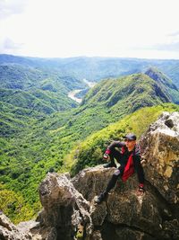 Man looking at mountain