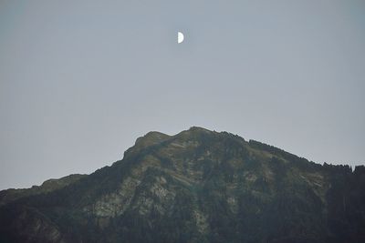 Low angle view of mountain against clear sky