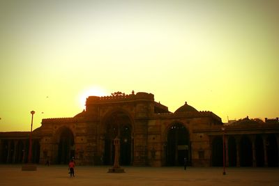 People in front of historical building