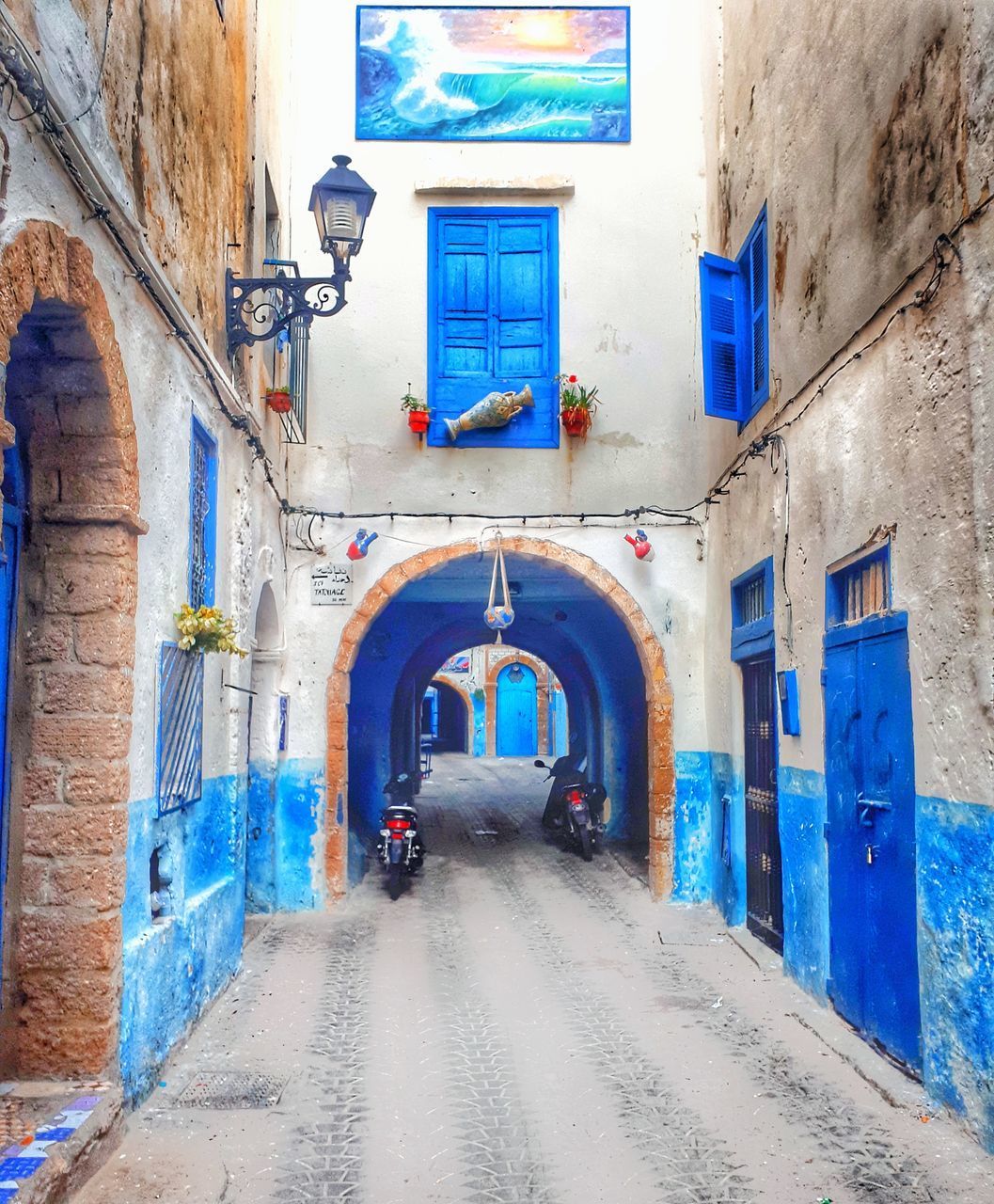 BUILDING AND BLUE WALL