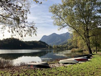 Scenic view of lake and mountains against sky