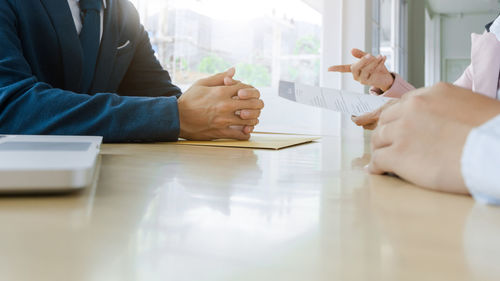 Close-up of man working on table