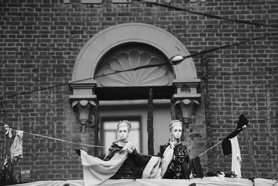 Shadow of person on brick wall