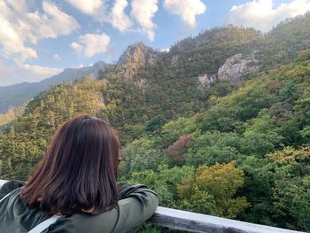 Young woman looking at mountain