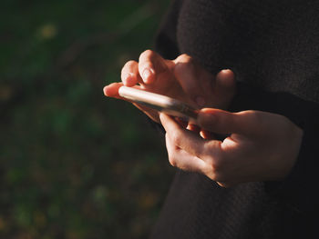 Close-up of woman holding hands