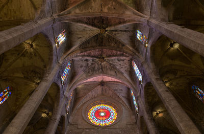 Low angle view of ornate ceiling of building