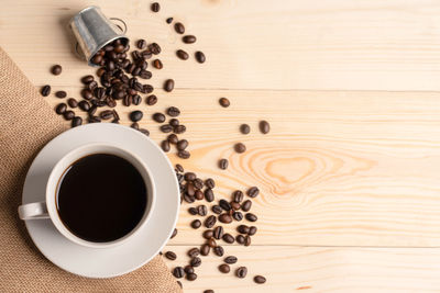 High angle view of coffee cup on table