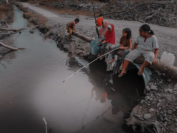 High angle view of people in lake