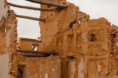 Low angle view of old ruin building