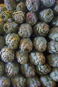 Full frame shot of artichokes for sale at market stall