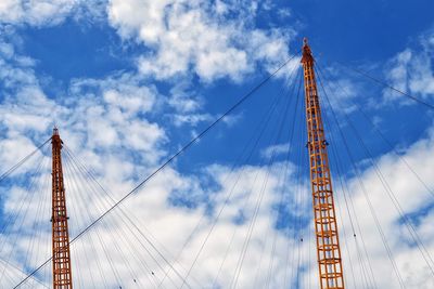 Low angle view of ferris wheel against sky
