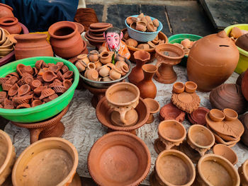 High angle view of various earthenware for sale at market