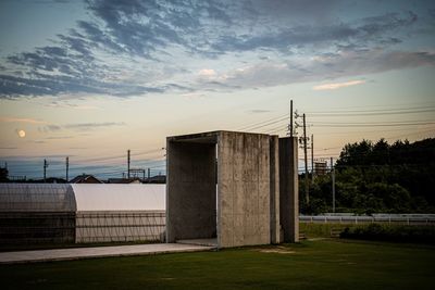 Scenic view of field against sky during sunset