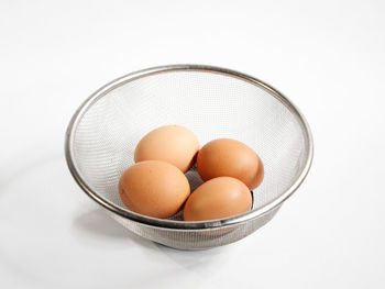 High angle view of eggs in container