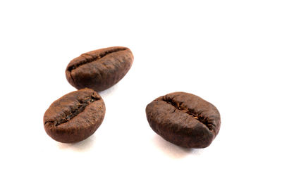 Close-up of bread against white background