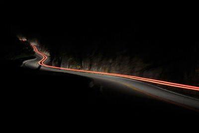 Light trails on road at night