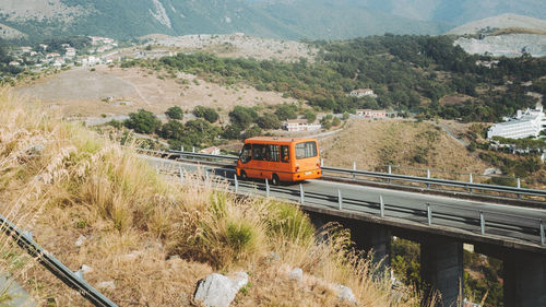 High angle view of small bus on railroad track