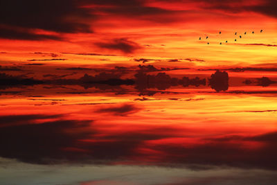 Scenic view of dramatic sky during sunset