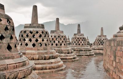 Statue of temple against sky