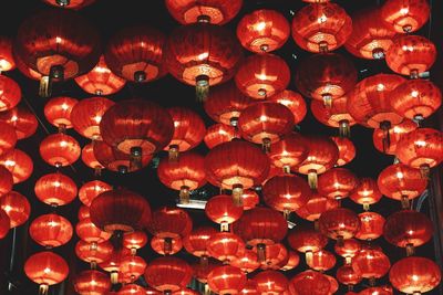 Low angle view of illuminated lanterns hanging