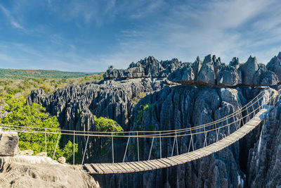 Panoramic view of bridge over mountain against sky