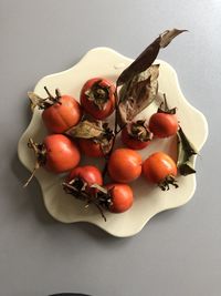 High angle view of fruits in plate on table