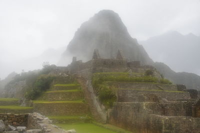 Panoramic view of old ruins against sky