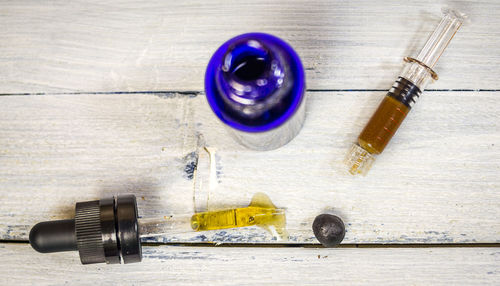 High angle view of bottles on table