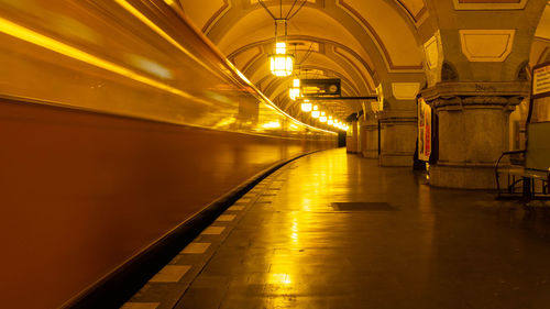 Illuminated corridor of building