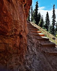 Rock formation on mountain against sky