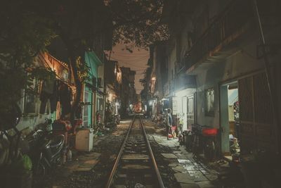 Railroad tracks amidst trees