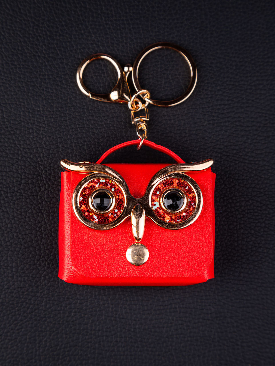 jewellery, fashion accessory, keychain, red, indoors, pendant, studio shot, no people, single object, close-up, metal
