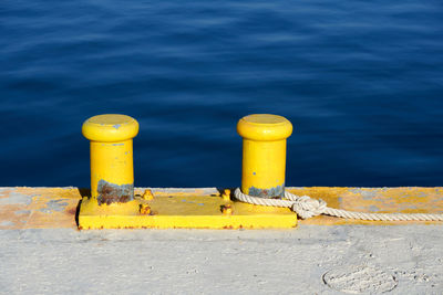 High angle view of yellow container on sea