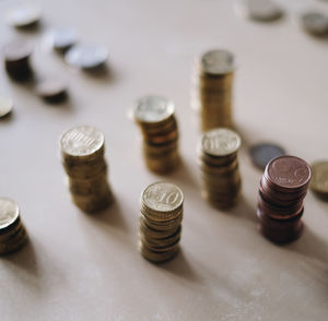 High angle view of coins on table