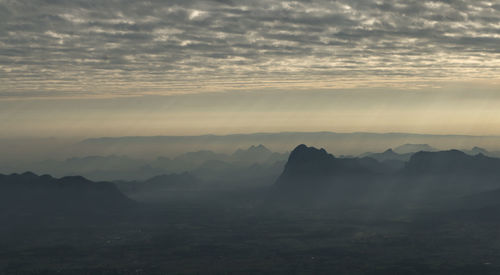 Scenic view of mountains against sky during sunset