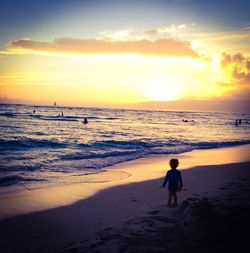 Scenic view of sea at sunset