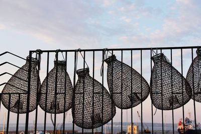 Low angle view of clothes drying against sky