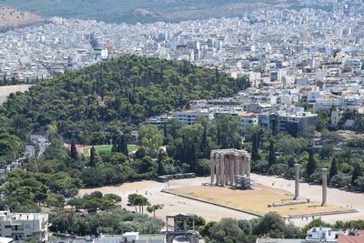 High angle view of buildings and trees in city