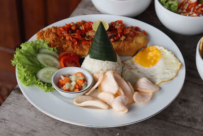 High angle view of breakfast served on table