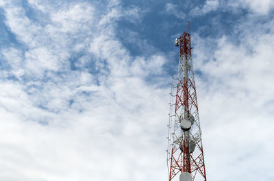 Tower mobile phone with blue sky and sun light, with copy space