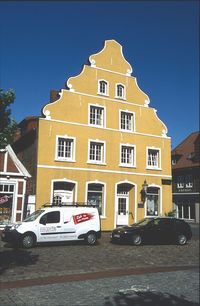 View of residential building against blue sky